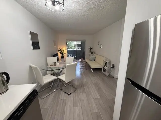 205 1948 COQUITLAM AVENUE - photo 1 of 15