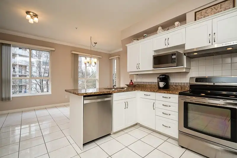 313 3098 GUILDFORD WAY - photo 4 of 25