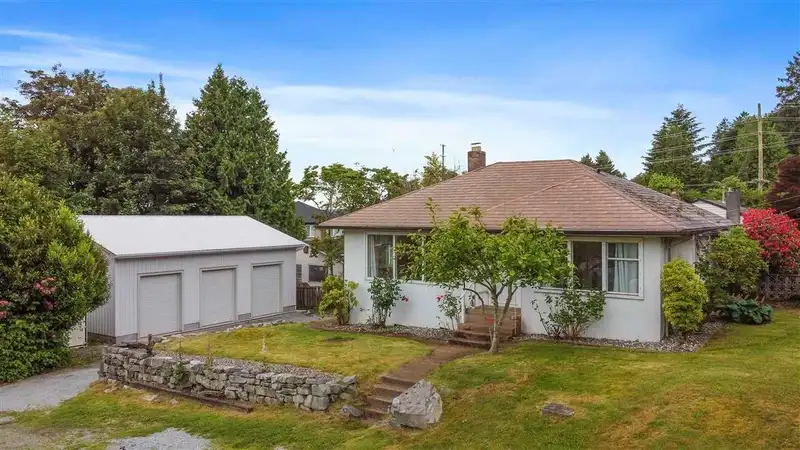 7489 MAPLE STREET - photo 1 of 25