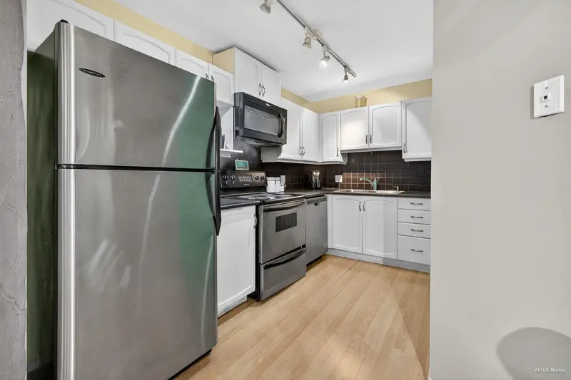 307 2958 TRETHEWEY STREET - photo 2 of 17