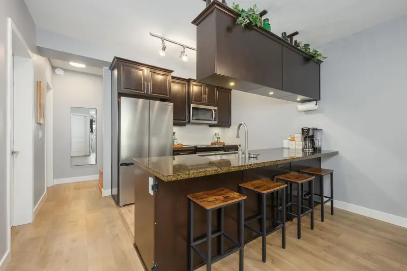 115 11887 BURNETT STREET - photo 1 of 25