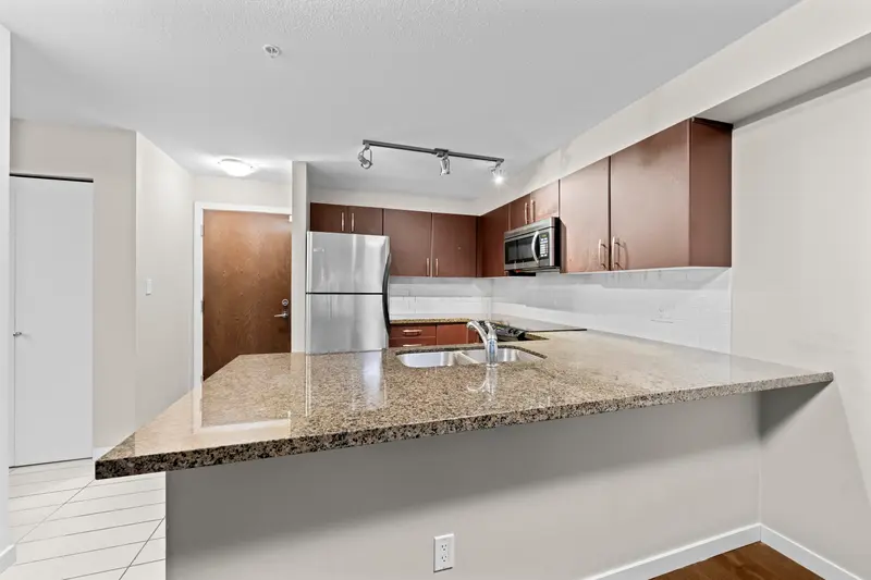 209 7337 MACPHERSON AVENUE - photo 1 of 19