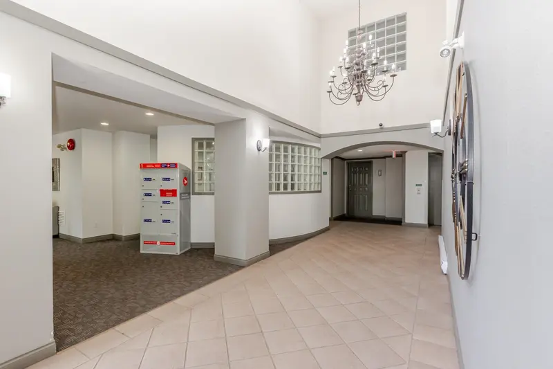 208 3176 GLADWIN ROAD - photo 3 of 25